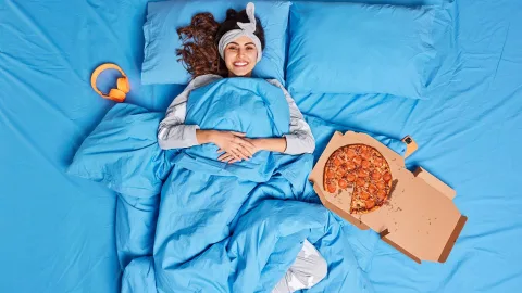 What Happens to Your Body If You Eat Standing Up or Lying Down: A Dietitian Explains